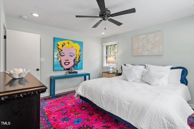 bedroom featuring ceiling fan, recessed lighting, and baseboards