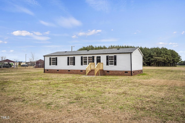 manufactured / mobile home with crawl space and a front lawn