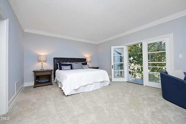 bedroom with visible vents, carpet flooring, crown molding, and baseboards