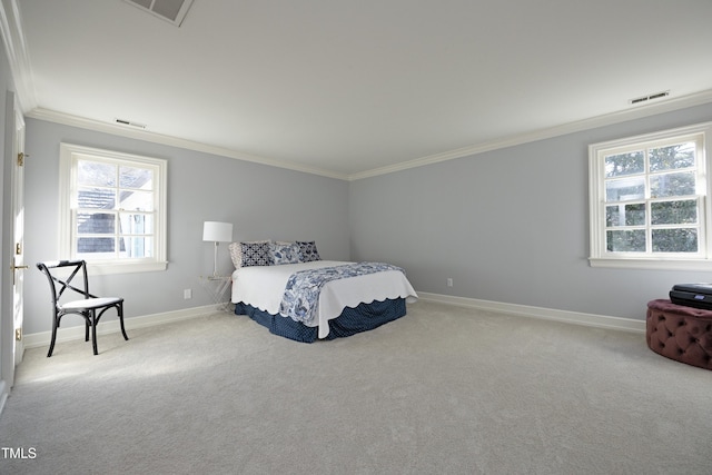 bedroom with baseboards, visible vents, carpet floors, and ornamental molding