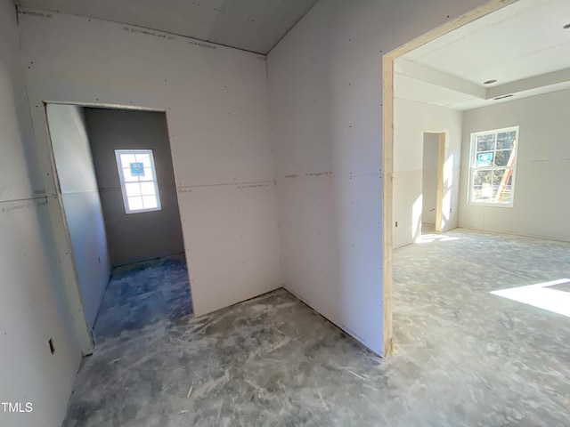 interior space with unfinished concrete flooring