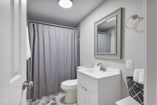 full bath featuring toilet and vanity