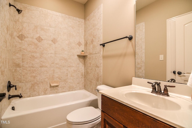 bathroom with shower / tub combination, vanity, and toilet