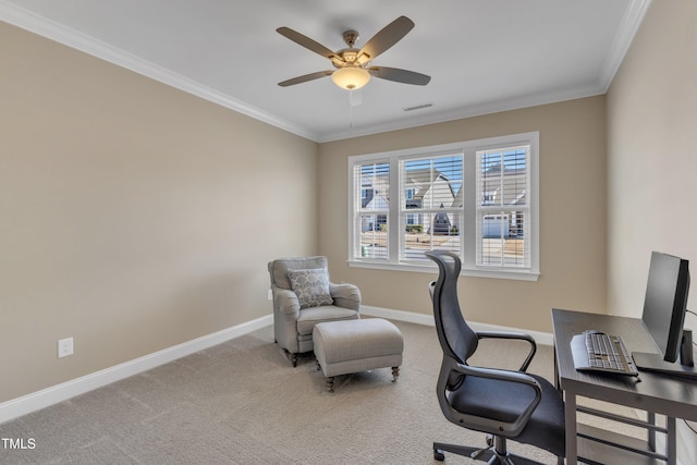 office space with a ceiling fan, baseboards, visible vents, light carpet, and crown molding