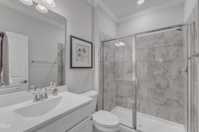 full bathroom with a shower stall, toilet, vanity, and ornamental molding