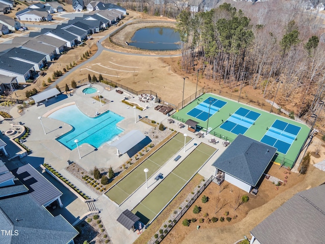 birds eye view of property featuring a water view