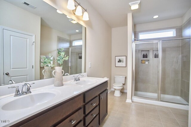 590 Grand Central Sta, Apex, NC 27502 - bathroom with tile patterned flooring, double vanity, and a stall shower