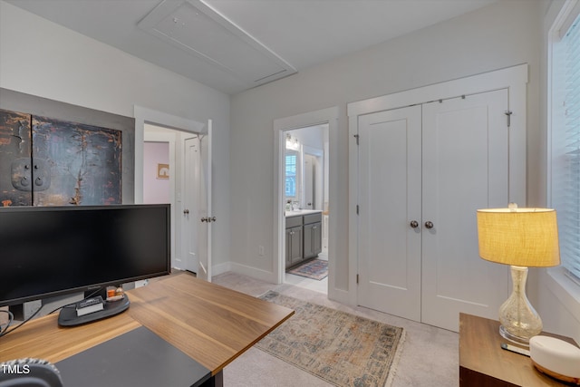 office area with attic access and baseboards