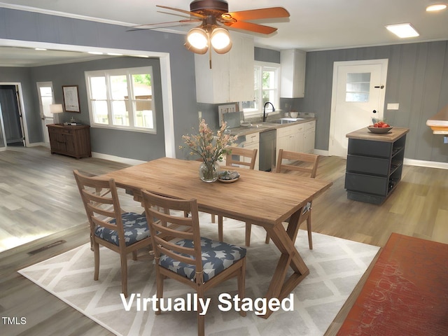 136 Dogwood Trl, Wendell, NC 27591 - dining room featuring ceiling fan, baseboards, and light wood-style floors