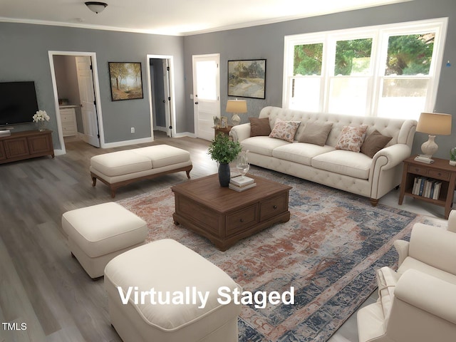 136 Dogwood Trl, Wendell, NC 27591 - living area featuring light wood-style floors, baseboards, and crown molding
