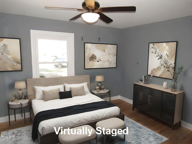 136 Dogwood Trl, Wendell, NC 27591 - bedroom featuring wood finished floors, baseboards, and a ceiling fan