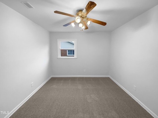 unfurnished room featuring a ceiling fan, carpet flooring, visible vents, and baseboards