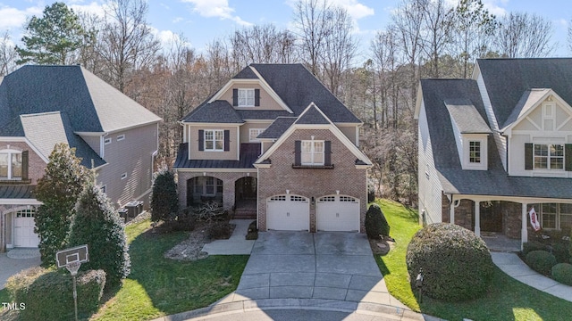 view of front of house with concrete driveway, a front lawn, a porch, and brick siding