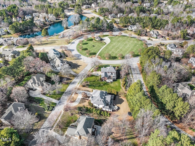 aerial view with a water view and a residential view