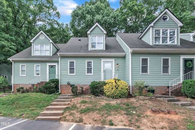 410 Oak Run Dr, Raleigh, NC 27606 - cape cod house featuring stairway