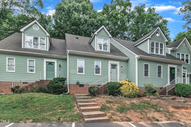 410 Oak Run Dr, Raleigh, NC 27606 - view of front facade with stairway and a front yard