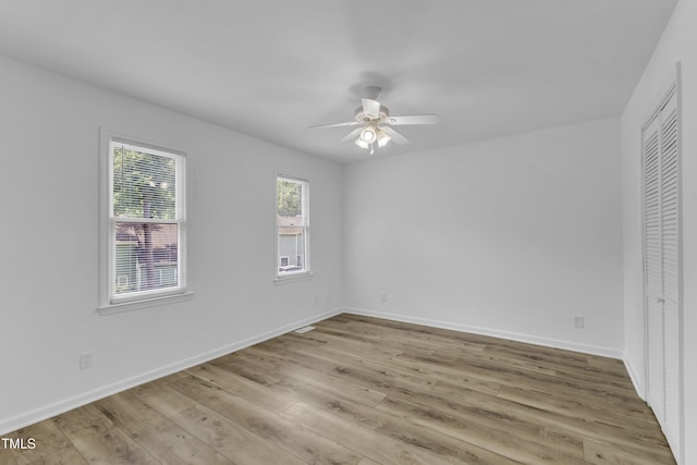 410 Oak Run Dr, Raleigh, NC 27606 - unfurnished bedroom featuring wood finished floors and a ceiling fan
