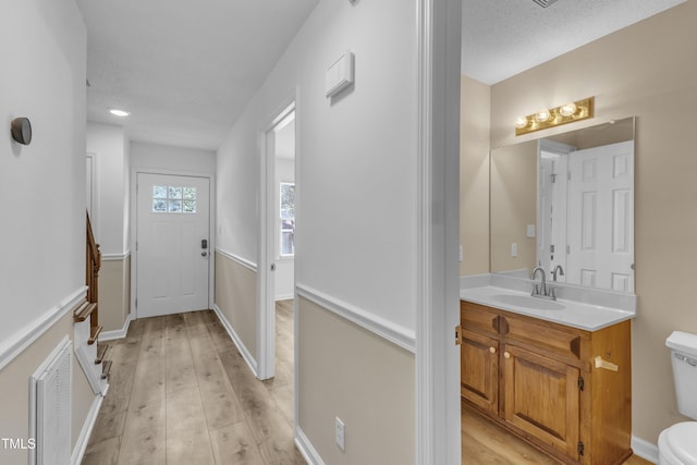 410 Oak Run Dr, Raleigh, NC 27606 - doorway to outside featuring light wood-style flooring