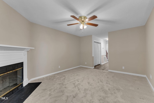 410 Oak Run Dr, Raleigh, NC 27606 - unfurnished living room with carpet flooring, a fireplace with flush hearth, and ceiling fan