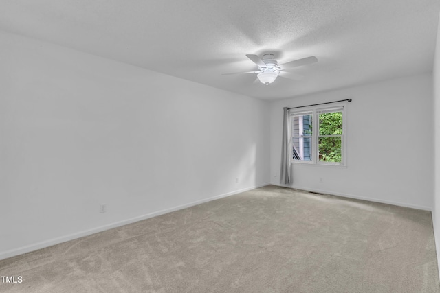 410 Oak Run Dr, Raleigh, NC 27606 - unfurnished room featuring a ceiling fan, carpet floors, and a textured ceiling