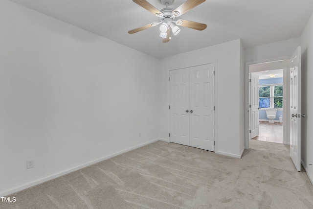 410 Oak Run Dr, Raleigh, NC 27606 - unfurnished bedroom with light colored carpet, a closet, and ceiling fan
