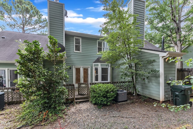 410 Oak Run Dr, Raleigh, NC 27606 - back of house with a chimney and french doors