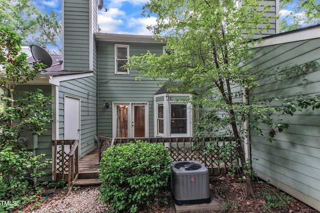 410 Oak Run Dr, Raleigh, NC 27606 - back of house featuring a chimney and a deck