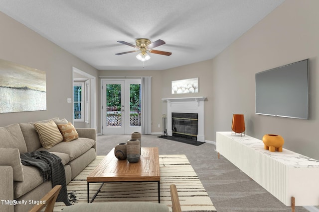 410 Oak Run Dr, Raleigh, NC 27606 - living area featuring ceiling fan, light colored carpet, and a fireplace with flush hearth