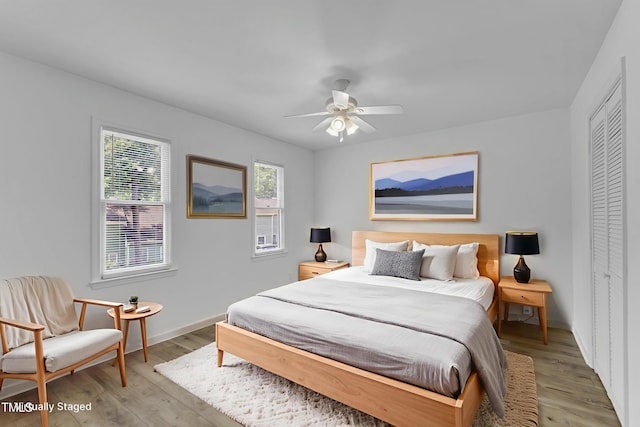 410 Oak Run Dr, Raleigh, NC 27606 - bedroom with light wood-style flooring and ceiling fan