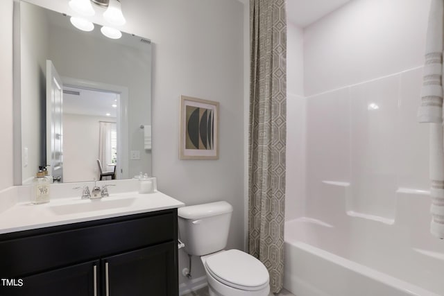 bathroom featuring vanity, toilet, and shower / bathtub combination with curtain