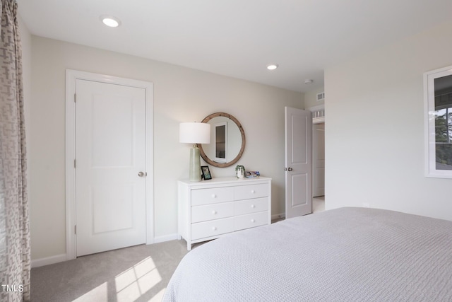 bedroom featuring light carpet, baseboards, visible vents, and recessed lighting