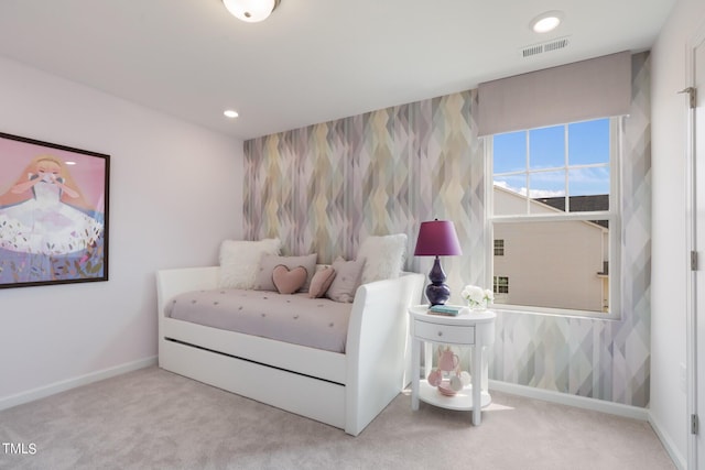 bedroom with wallpapered walls, visible vents, baseboards, light colored carpet, and recessed lighting