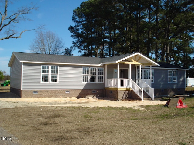 view of front facade with crawl space and covered porch