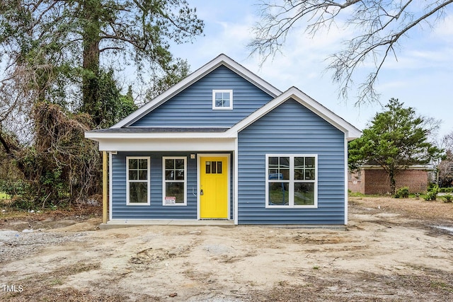 bungalow-style home with covered porch