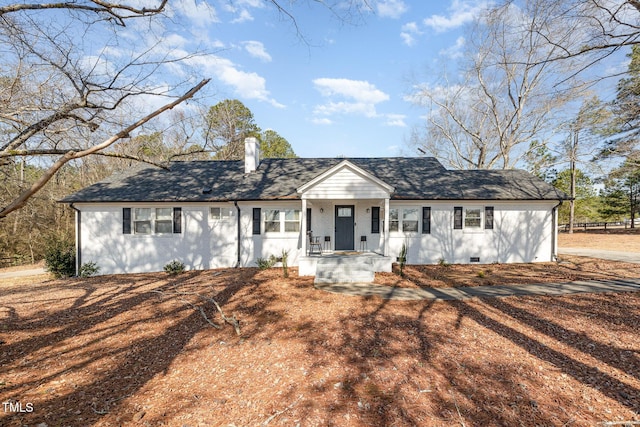 ranch-style house with a shingled roof, crawl space, and a chimney