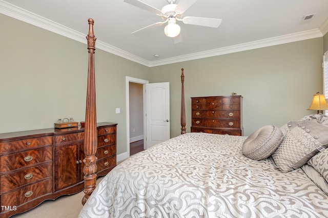 carpeted bedroom featuring visible vents, crown molding, baseboards, and ceiling fan