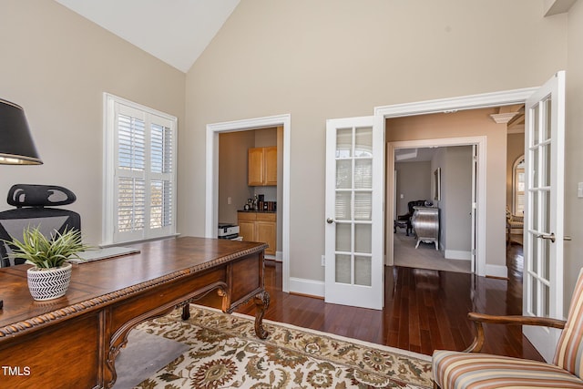 office space featuring dark wood-style floors, french doors, high vaulted ceiling, and baseboards