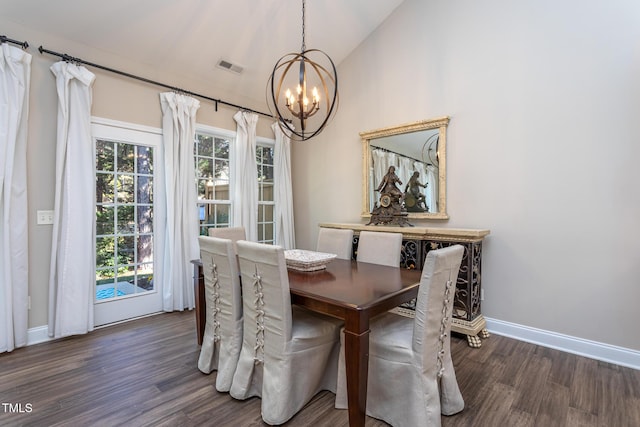 dining space featuring lofted ceiling, a healthy amount of sunlight, dark wood-style floors, and visible vents