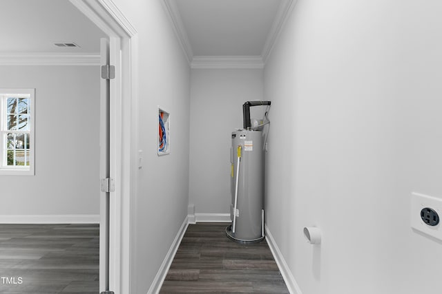 utility room with water heater and visible vents