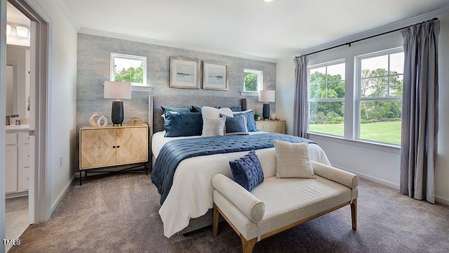 bedroom with light colored carpet, crown molding, baseboards, and multiple windows