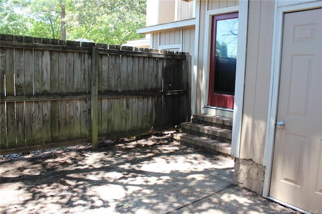 view of patio / terrace with entry steps and fence