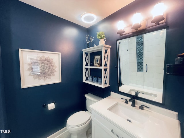 4271 Millet St SW, Concord, NC 28027 - bathroom featuring toilet, baseboards, vanity, and a shower
