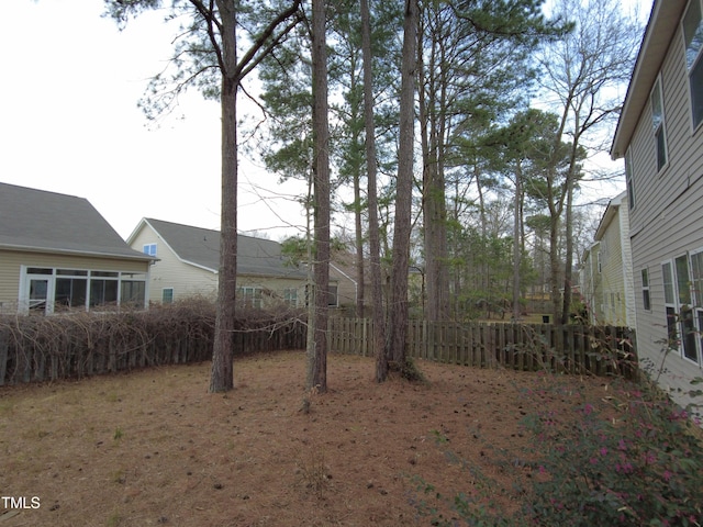 view of yard featuring fence