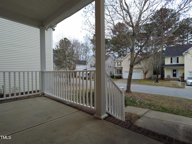 balcony featuring a residential view