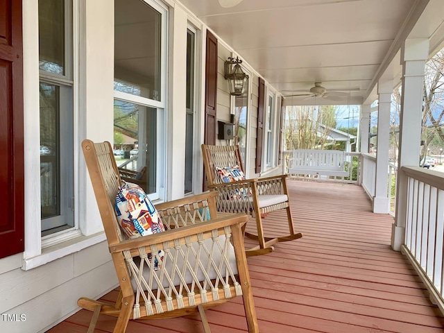 wooden terrace with a porch