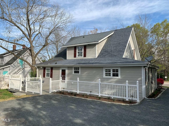 view of front of house with fence