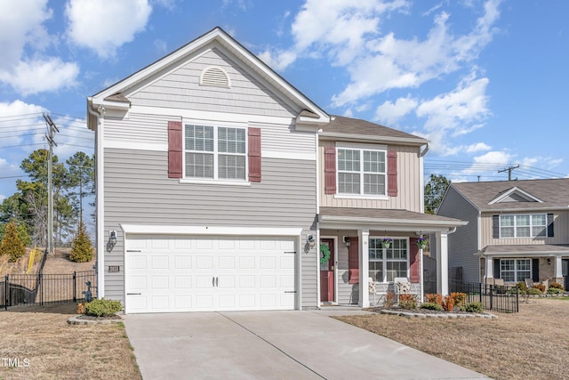 traditional-style house featuring a porch, concrete driveway, an attached garage, board and batten siding, and fence