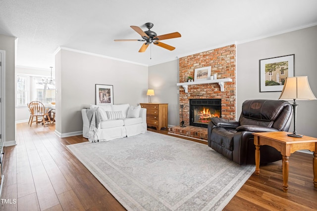 living room featuring baseboards, dark wood finished floors, and crown molding