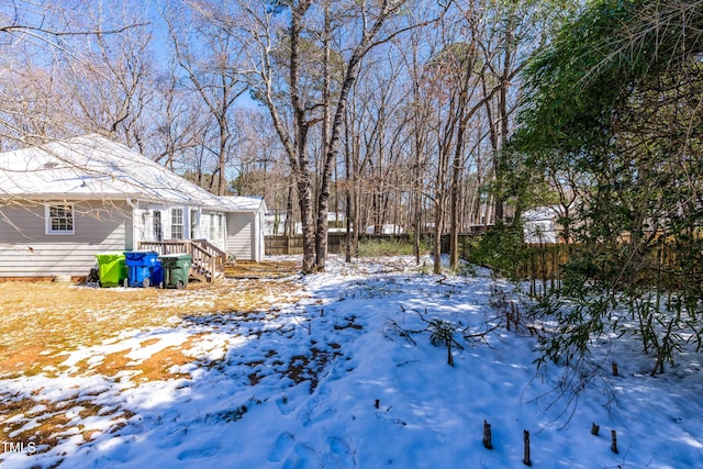 view of yard covered in snow