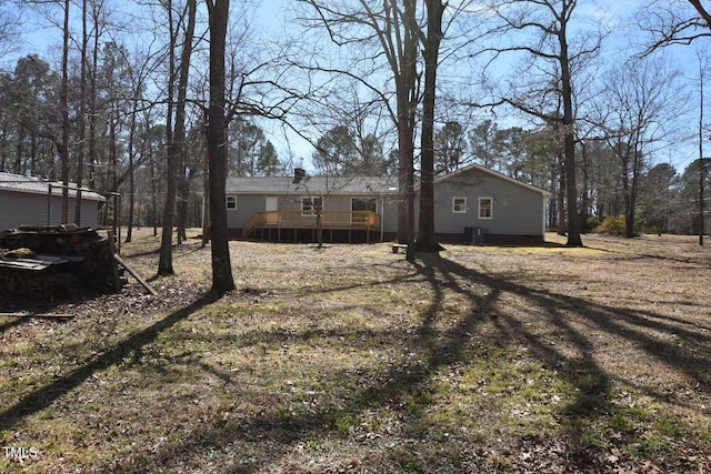 exterior space featuring a wooden deck